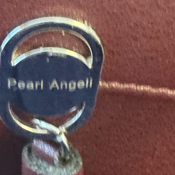 Burgundy Faux Leather Tassel Wristlet/Crossbody purse. - Picture 10 of 10